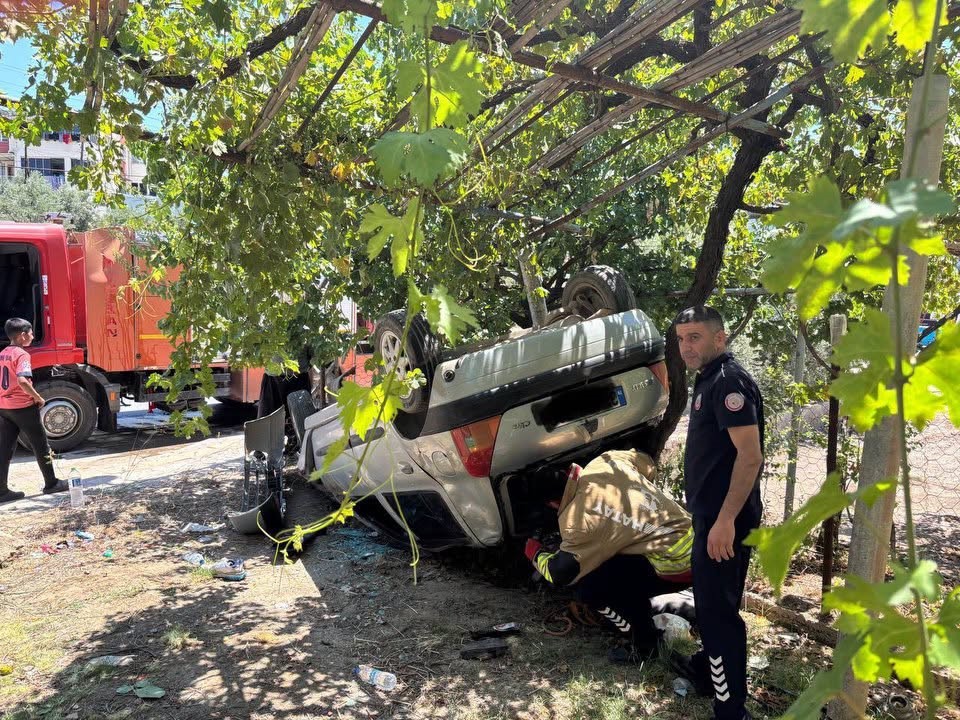 Takla atarak bahçeye uçan otomobilin sürücüsü yaralandı