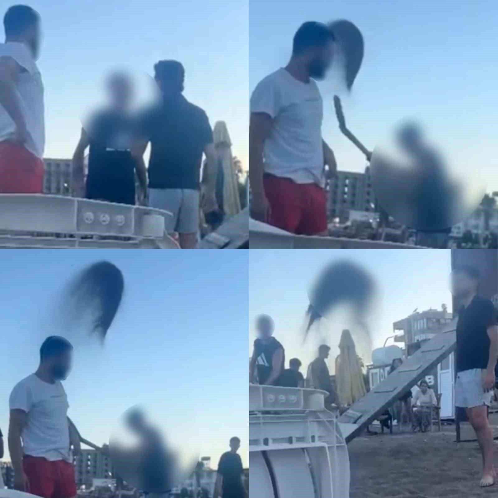 Plajdan kaldırılmak istenen gençlere kum fırlatıldı: 2 gözaltı