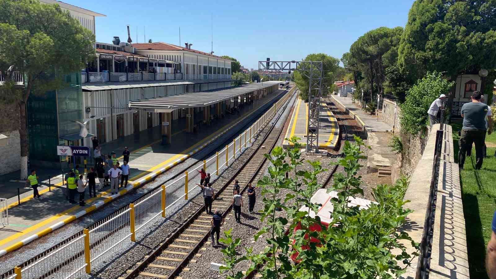 Tren yoluna atlamak isteyen adamı ekipler kurtardı