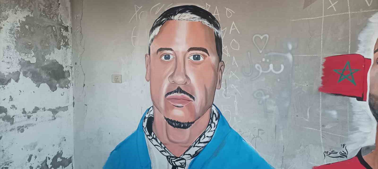 Gazze’de bir sanatçı daha, Filistin’i destekleyen ABD’li rapçi Macklemore’un duvar resmini yaptı