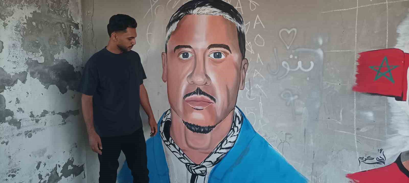 Gazze’de bir sanatçı daha, Filistin’i destekleyen ABD’li rapçi Macklemore’un duvar resmini yaptı